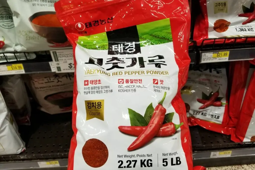 A packet of tae-kyung red pepper powder from a Korean store.