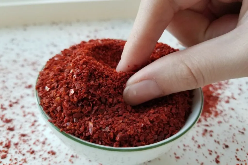 A bowl of gochugaru flakes.