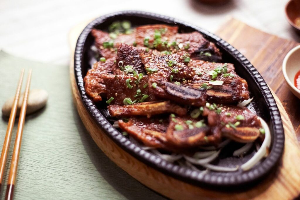 A plate of grilled barbecue with a Korean kalbi marinade.