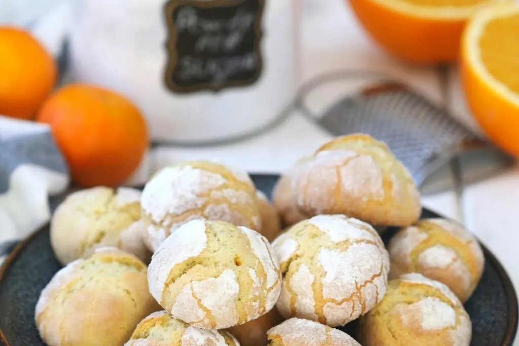 A batch of cookies flavored with orange zest and juice.