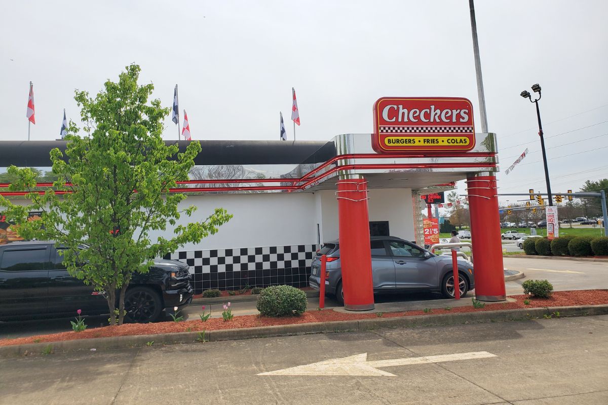 Vibrant exterior view of Checkers fast food restaurant chain.