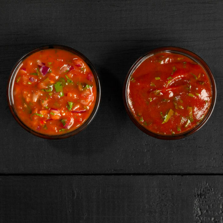 A side by side shot of a bowl of ketchup and a bowl of tomato sauce.