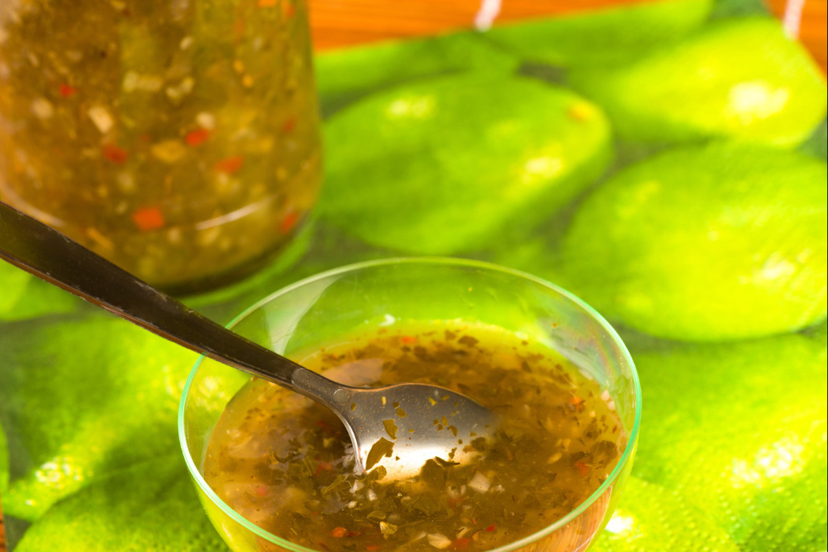 A bowl of homemade chimichurri sauce.