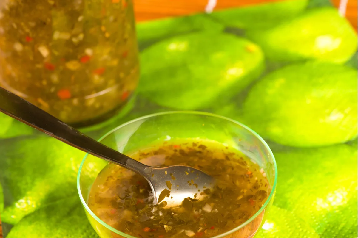 A bowl of homemade chimichurri sauce.