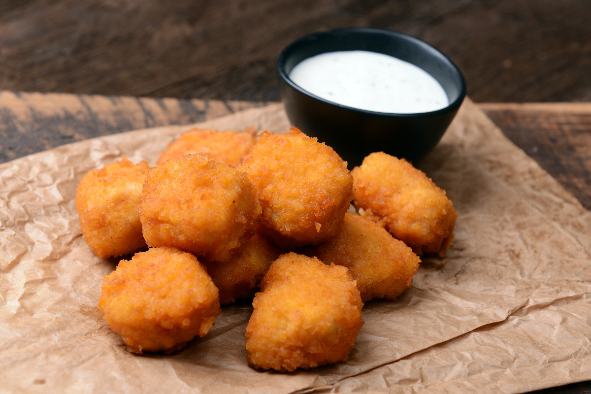 Crispy chicken nuggets paired with a creamy ranch dressing.