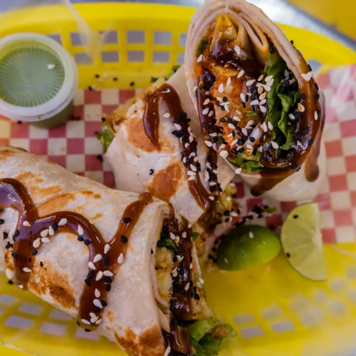 A delicious Mexican burrito coated in Salsa Taquera.