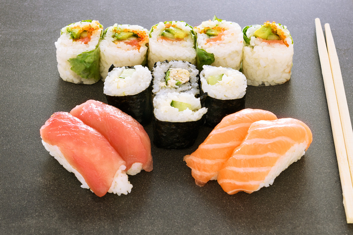 An assortment of various types of sushi. 