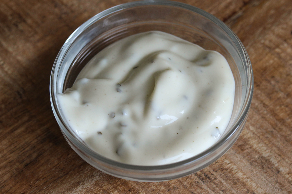 Dipping bowl of rich roasted garlic aioli sauce.