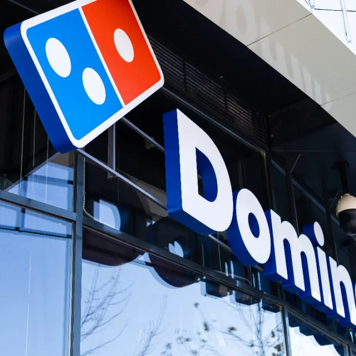 Domino's logo outside one of their restaurants.