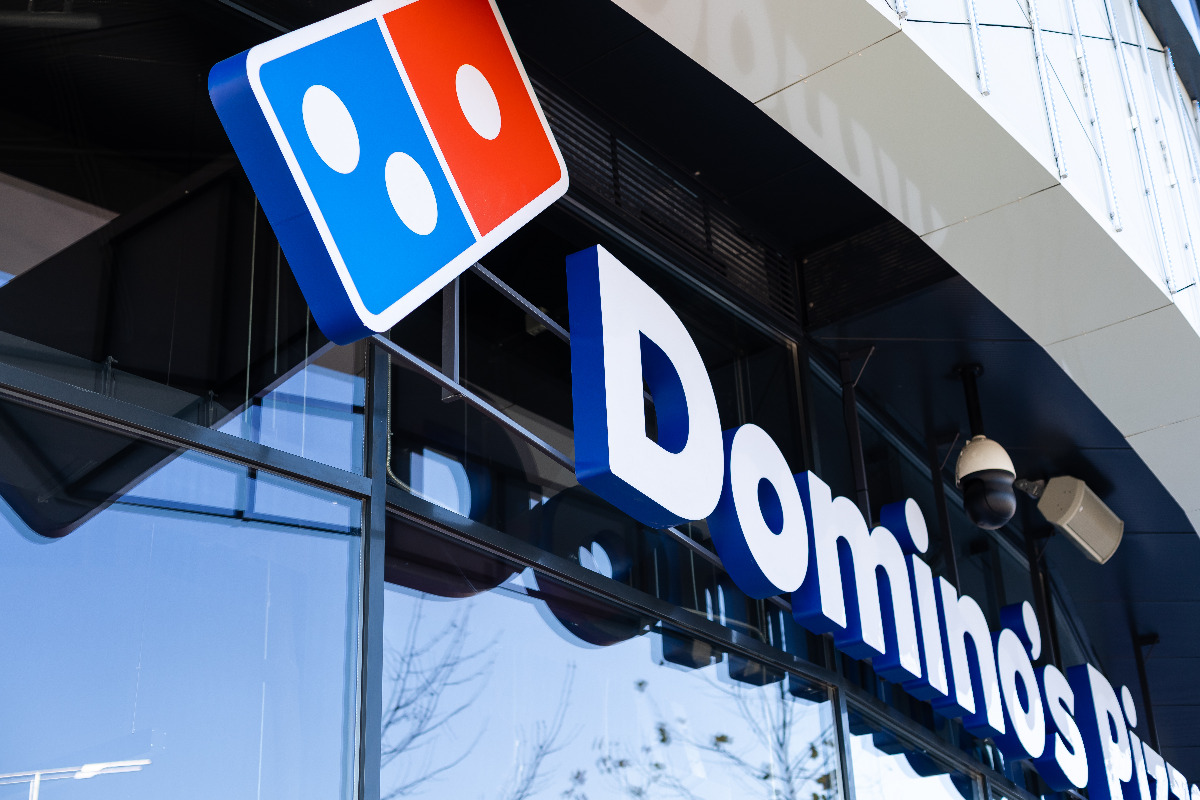 Domino's logo outside one of their restaurants.