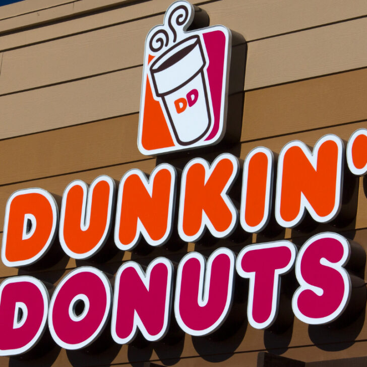 The outside logo of a Dunkin' Donuts restaurant.